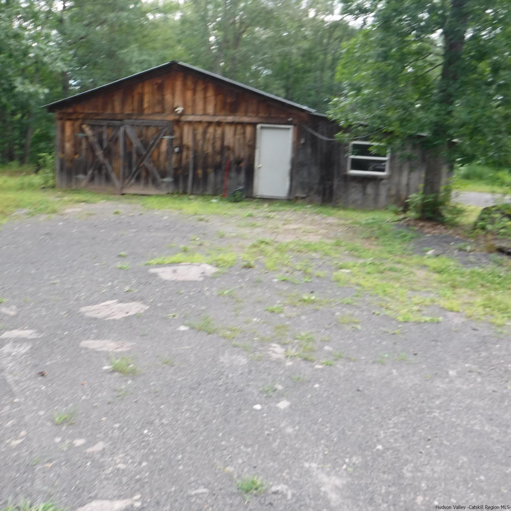 16 Stewart Road Cairo, NY 12470 - Photo 2 of 22 a view of a small house with a yard
