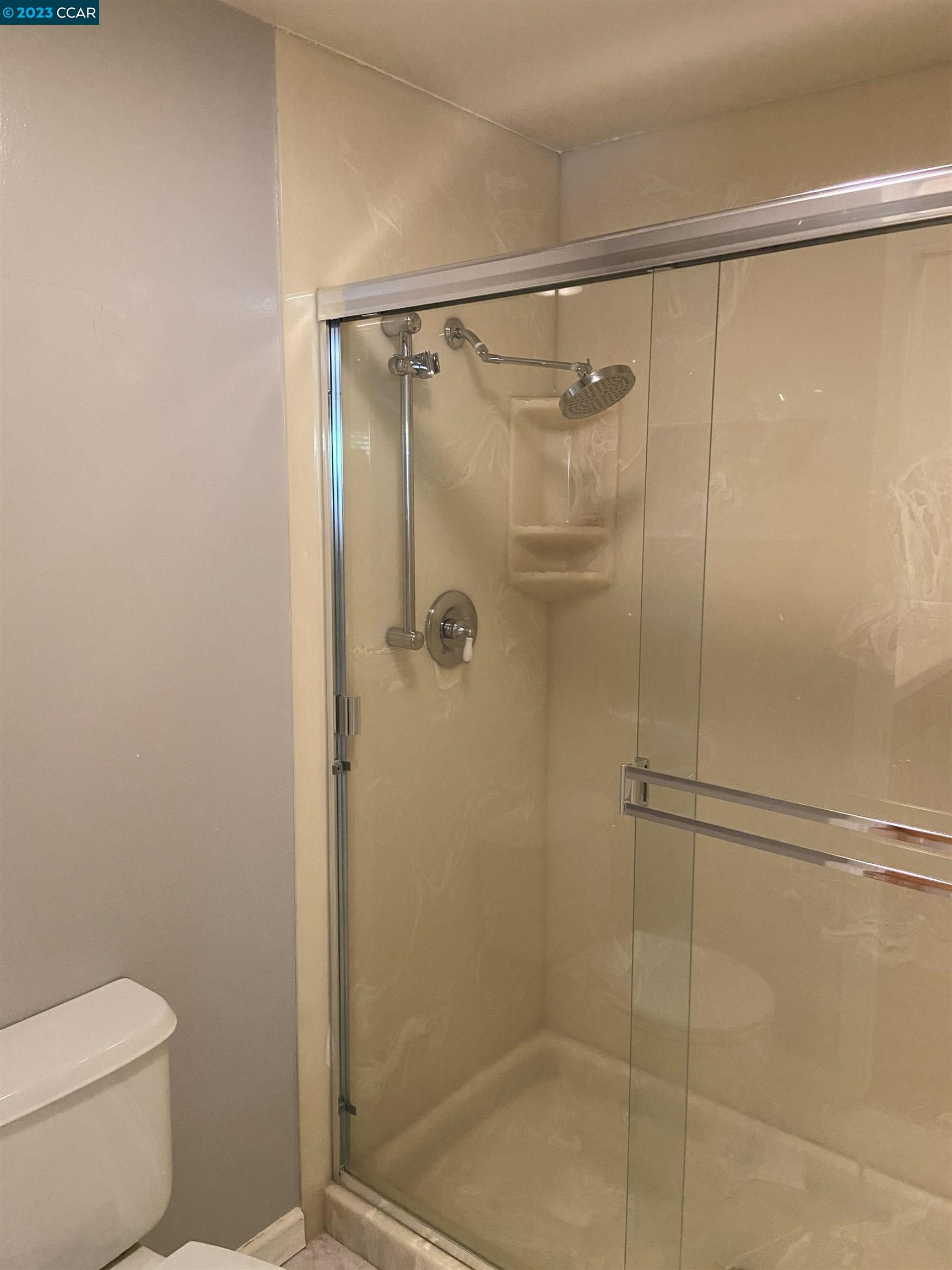 2202 Cascade Drive Walnut Creek, CA 94598 - Photo 14 of 23 a bathroom with a shower and a toilet