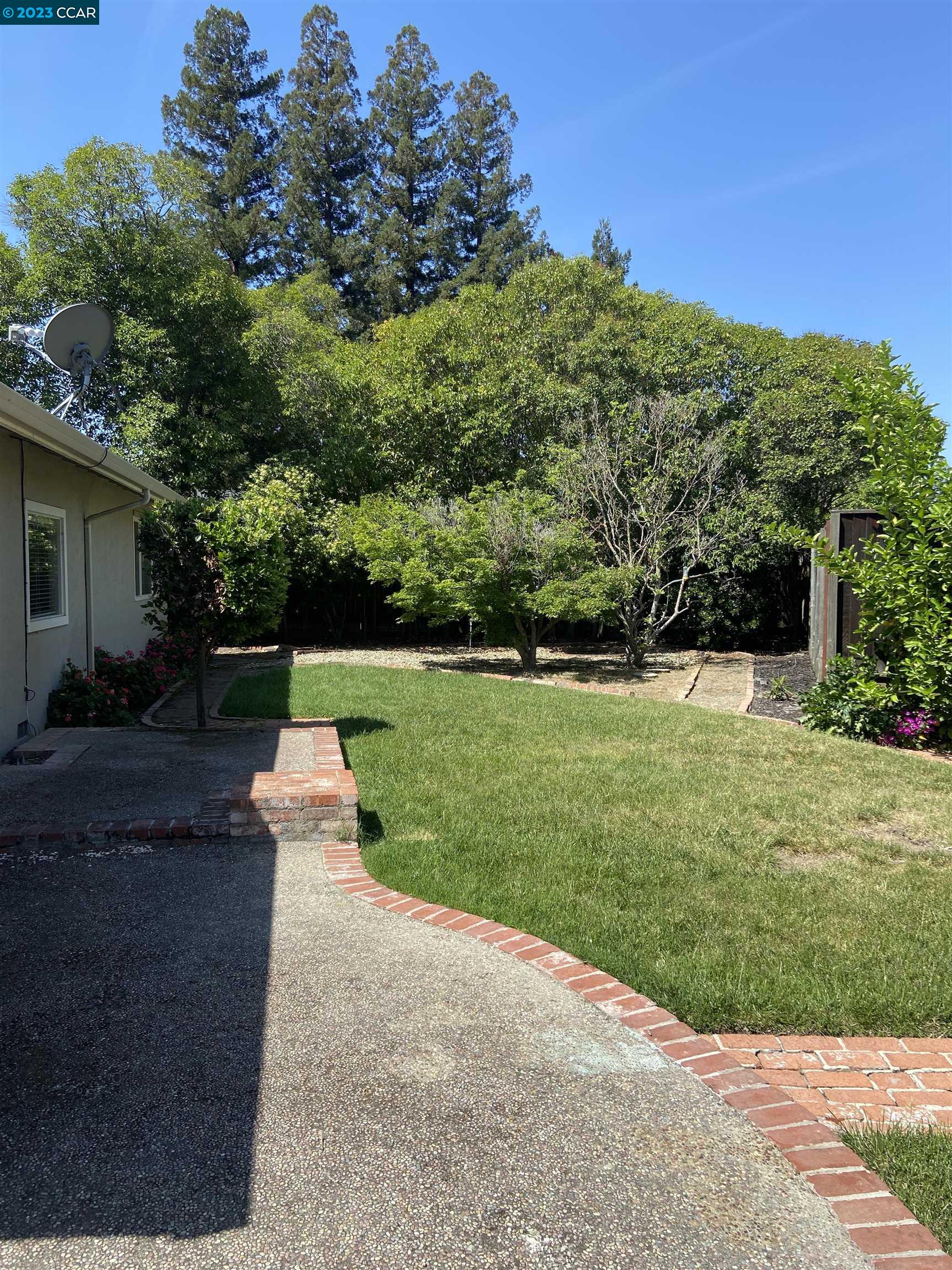 2202 Cascade Drive Walnut Creek, CA 94598 - Photo 19 of 23 a garden view with a seating space