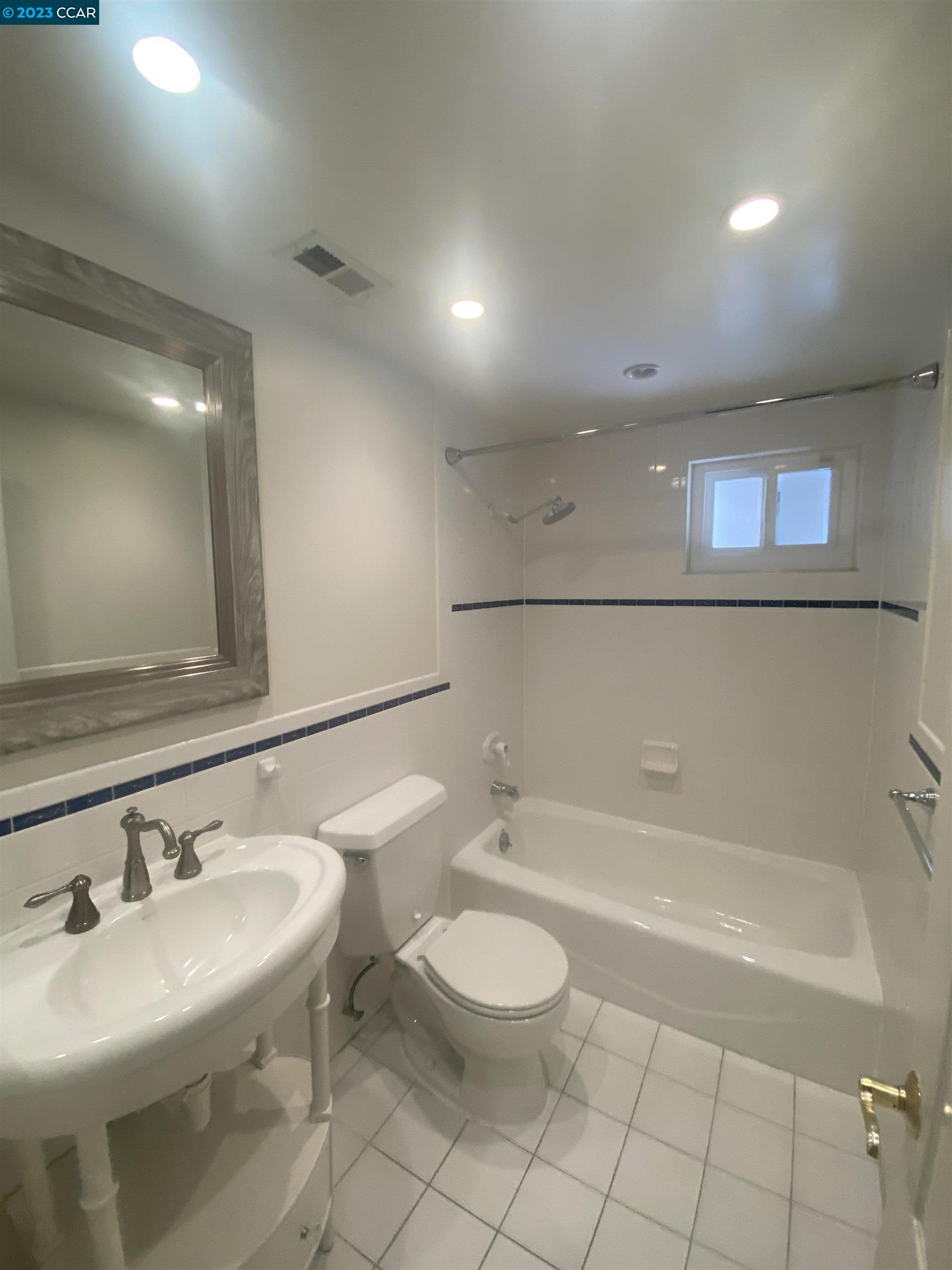 2202 Cascade Drive Walnut Creek, CA 94598 - Photo 21 of 23 a bathroom with a sink and a mirror
