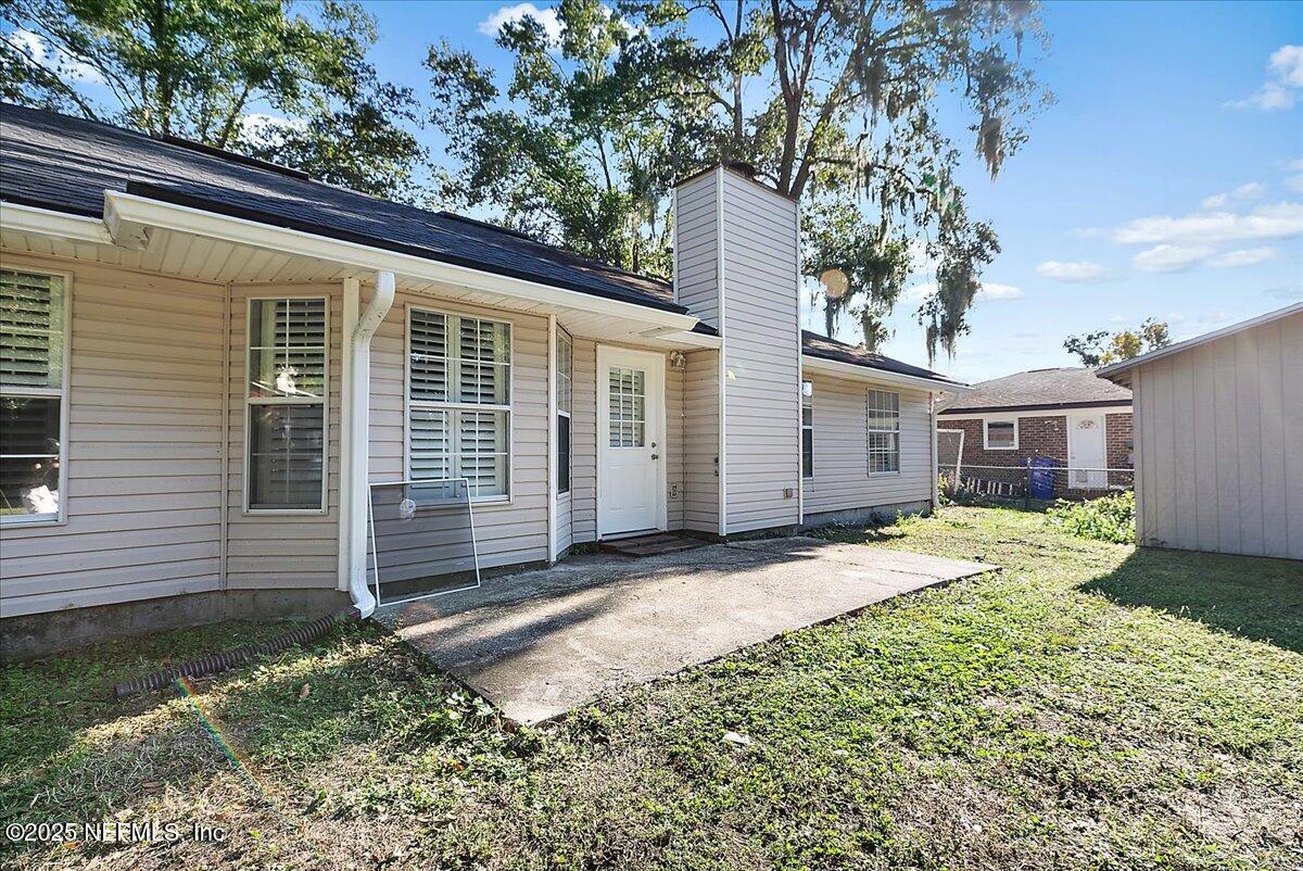 1315 Fruit Cove Road South Jacksonville, FL 32259 - Photo 17 of 19 a front view of a house with garden
