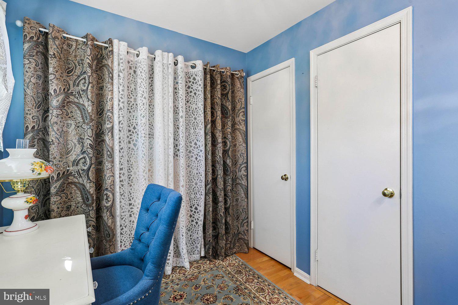 14822 Rose Trellis Place Silver Spring, MD 20906 - Photo 27 of 65 a view of a bedroom with furniture and a window