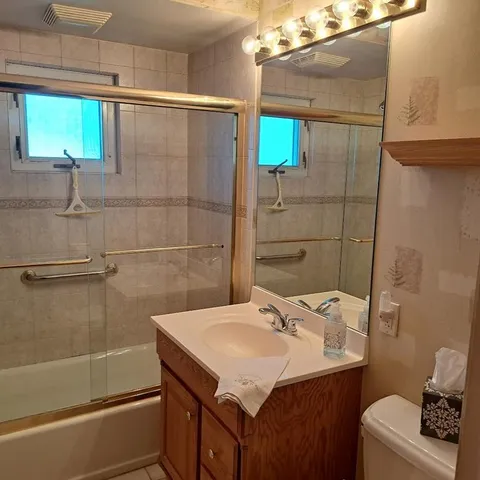 a bathroom with a sink and mirror