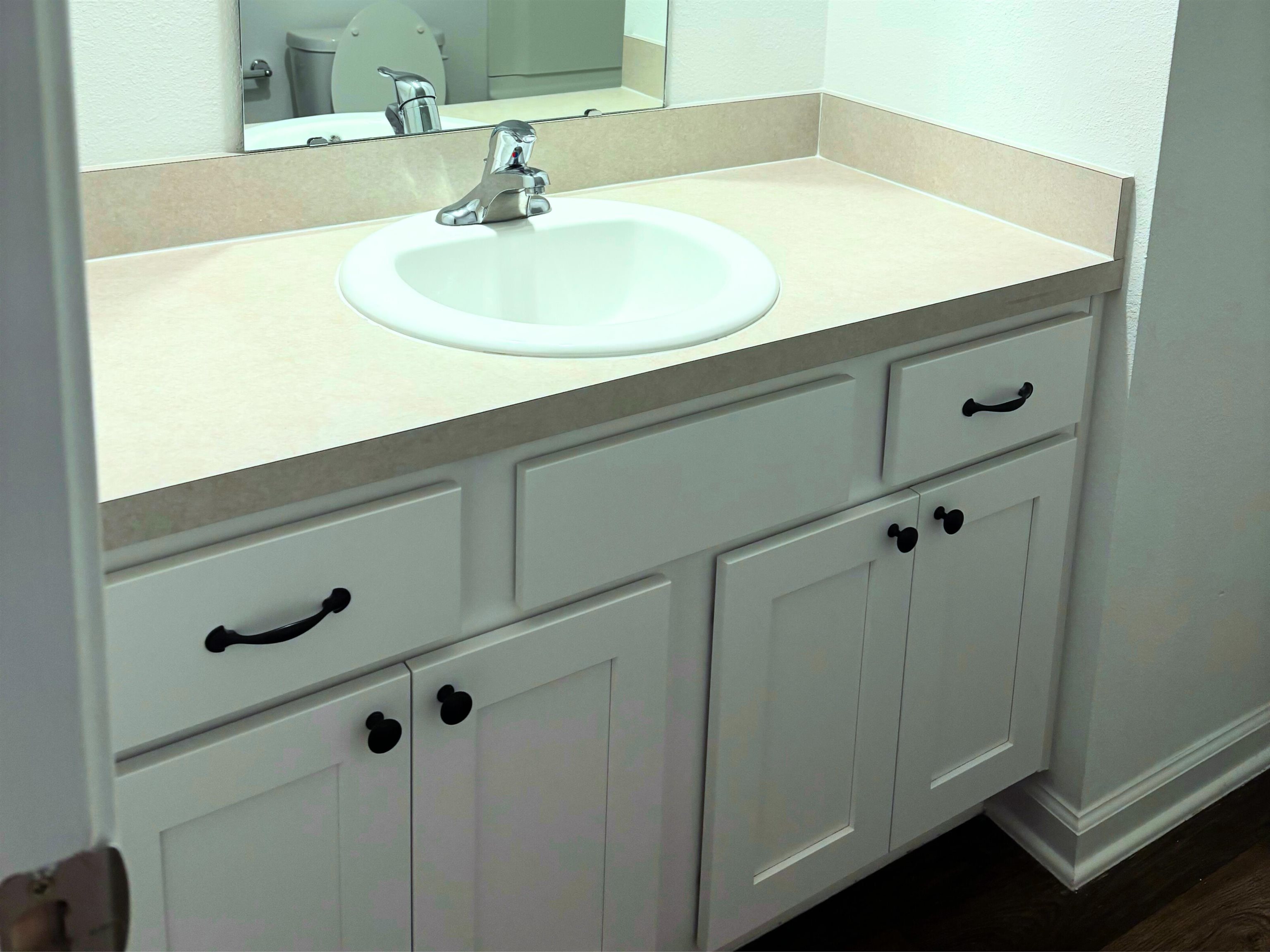 73 Elmhurst Lane St. Augustine, FL 32084 - Photo 12 of 21 a bathroom with a sink and a mirror