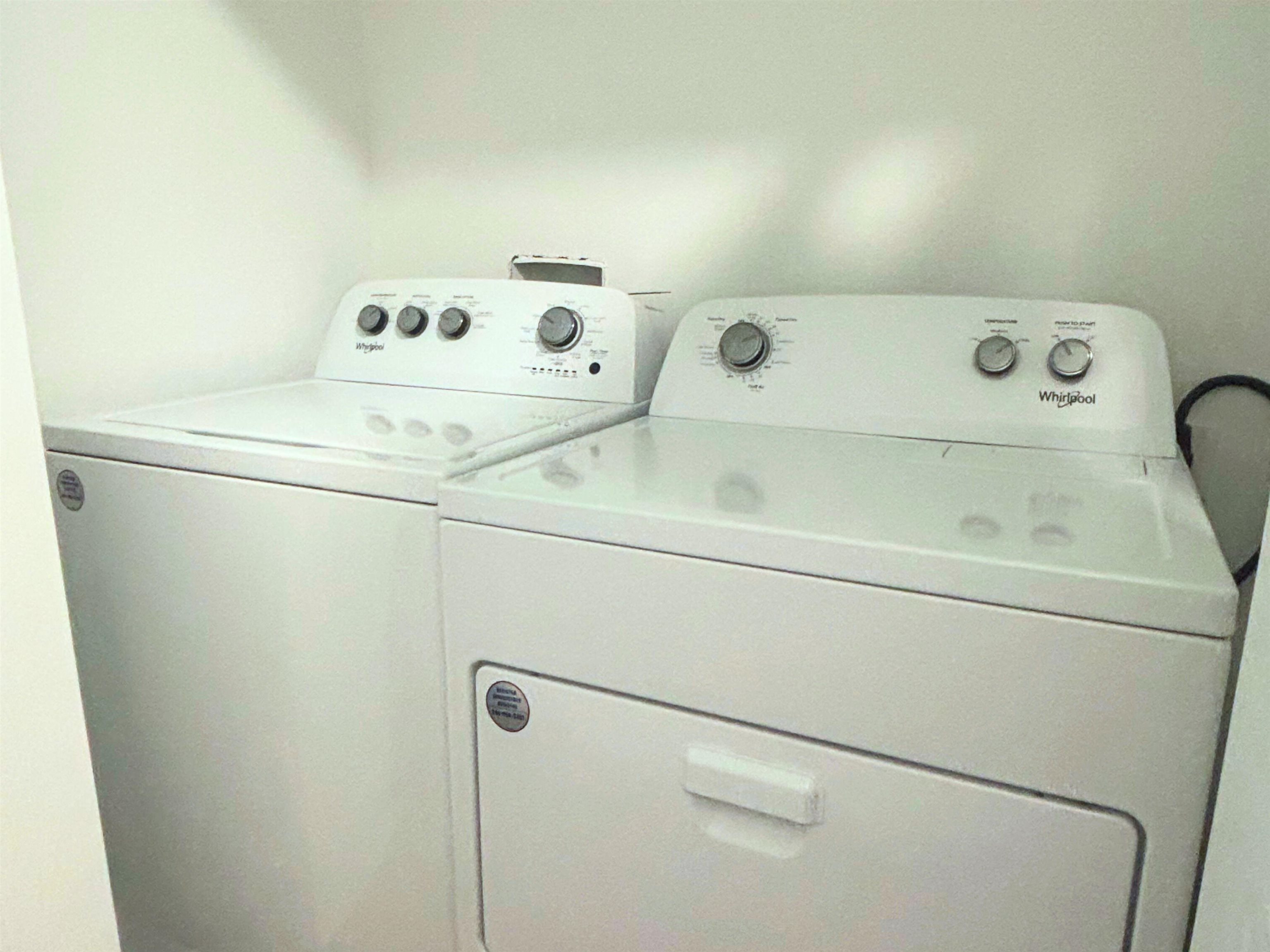 73 Elmhurst Lane St. Augustine, FL 32084 - Photo 15 of 21 a utility room with dryer and washer