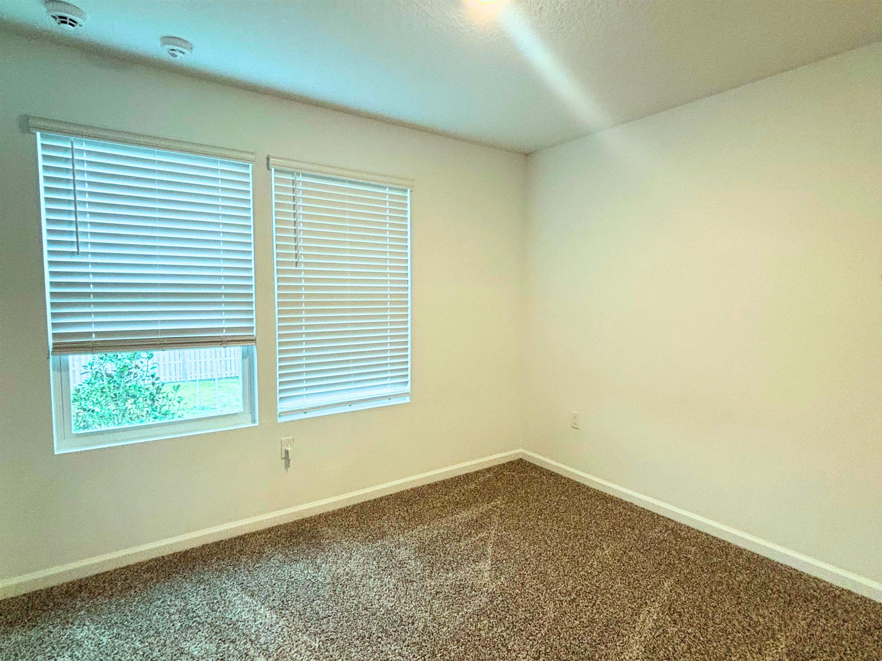 73 Elmhurst Lane St. Augustine, FL 32084 - Photo 17 of 21 an empty room with a window