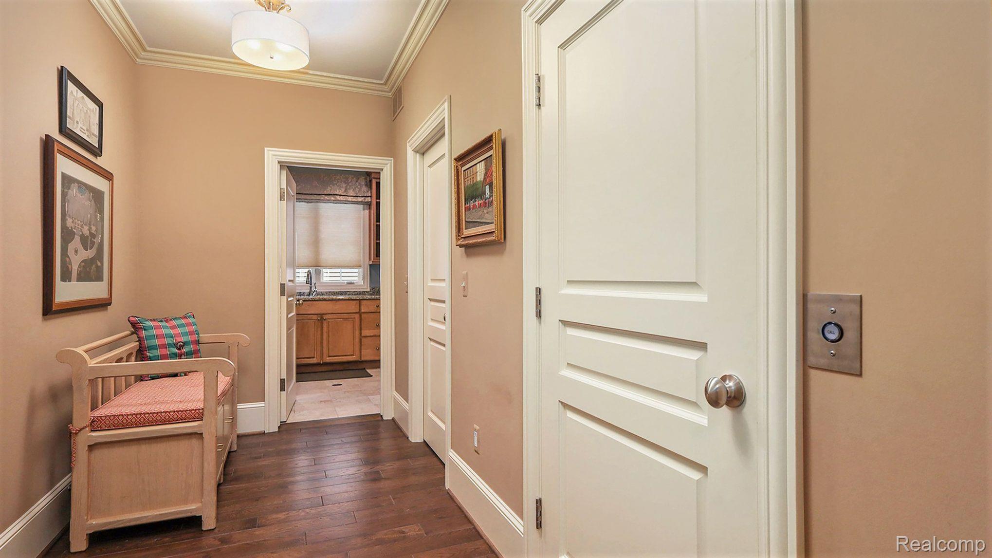 547 City View Court, Unit 30 Rochester, MI 48306 - Photo 34 of 47 Rear Hallway with Elevator