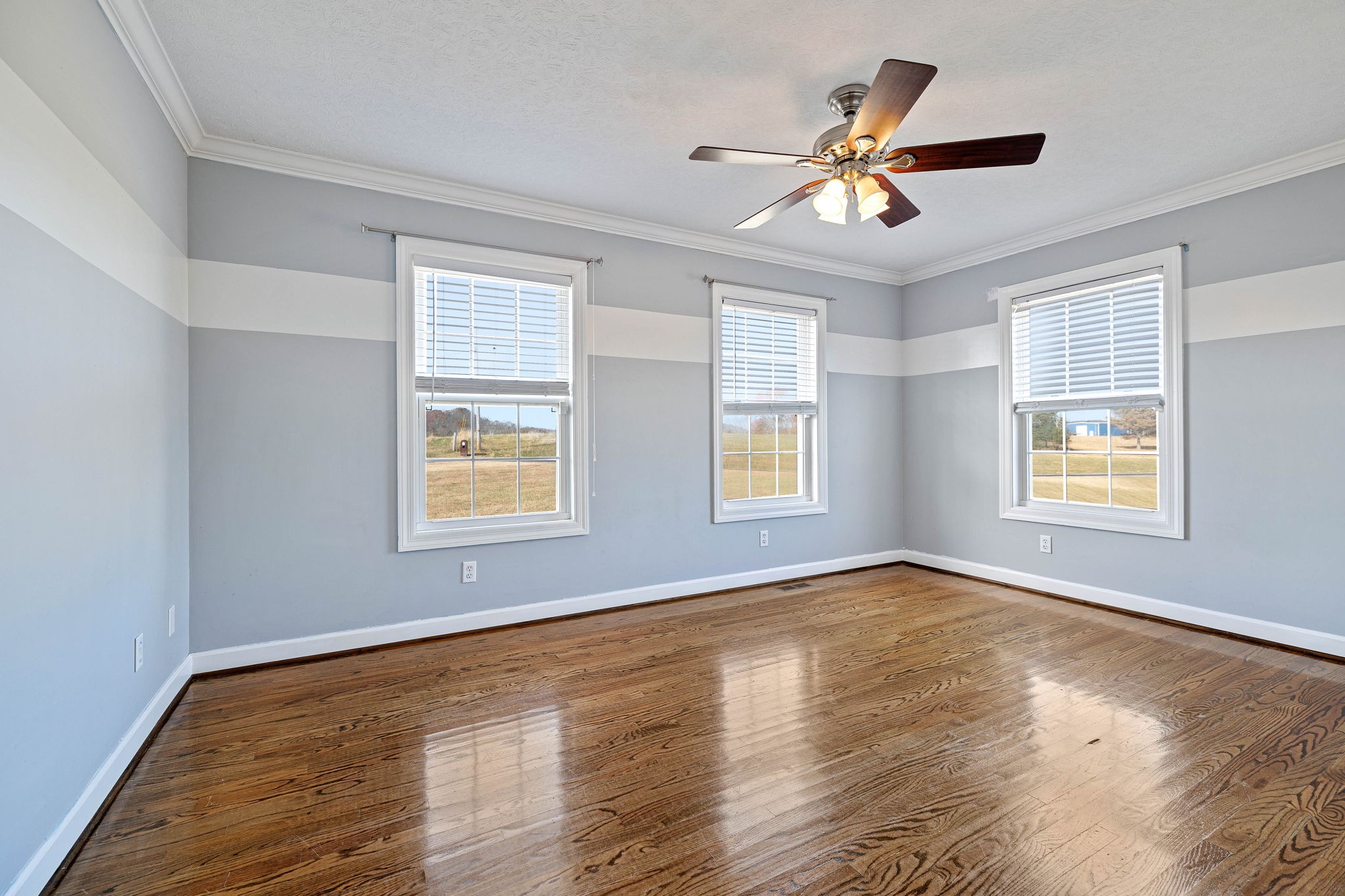 533 Rome Road Riddleton, TN 37151 - Photo 26 of 43 a view of an empty room with wooden floor and a window