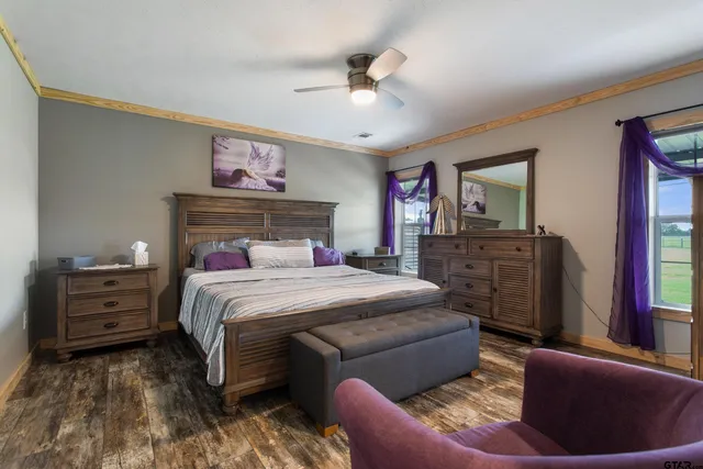 a bedroom with a bed and furniture