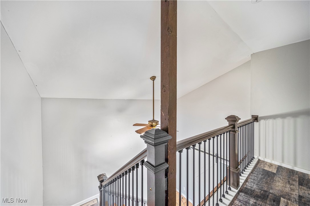 1796 Lander Road Mayfield Heights, OH 44124 - Photo 26 of 39 Stairs with wood-type flooring and lofted ceiling