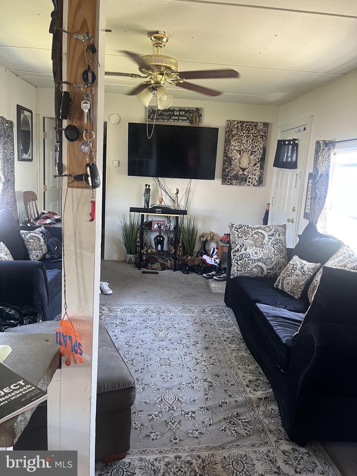 4191 Lake Road, Unit 25 Newfield, NJ 08344 - Photo 10 of 12 Cozy living space with inviting decor.