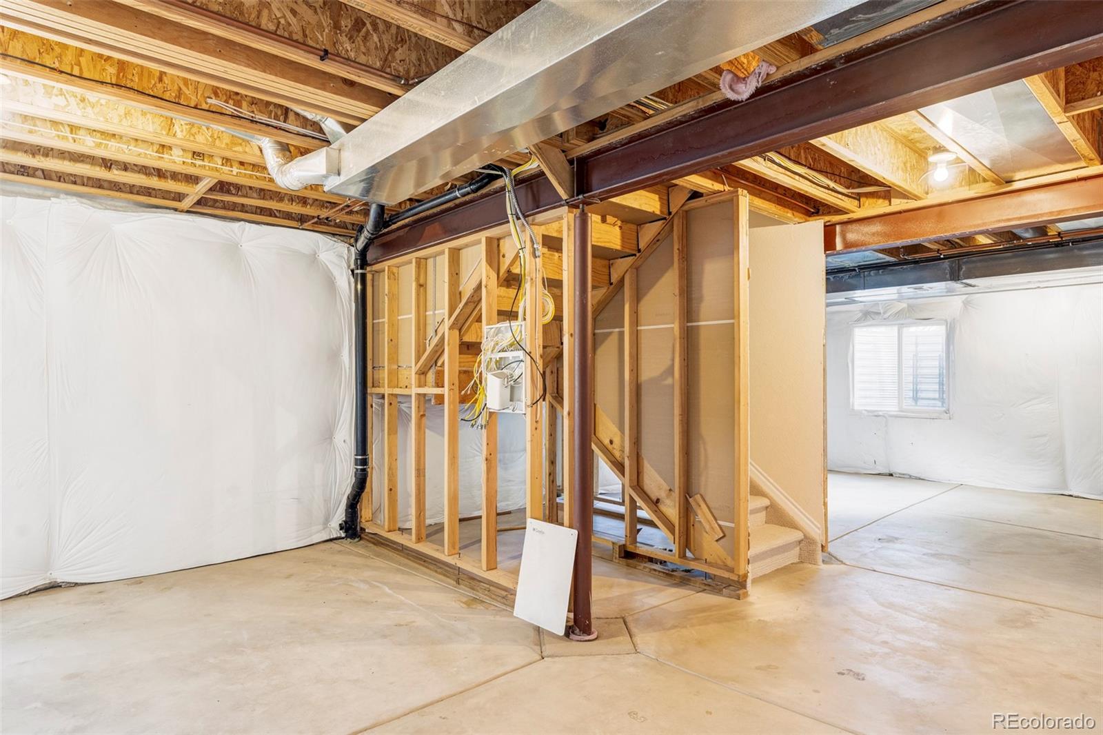 10715 Riverbrook Circle Highlands Ranch, CO 80126 - Photo 23 of 30 a view of a room with wooden walls