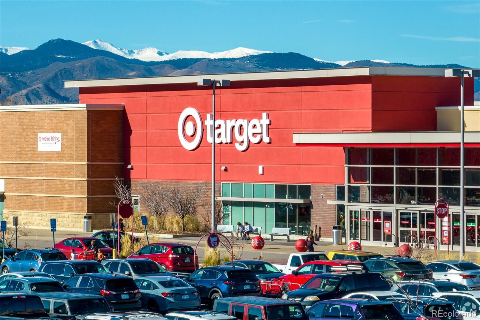 10715 Riverbrook Circle Highlands Ranch, CO 80126 - Photo 27 of 30 a group of cars parked in front of building