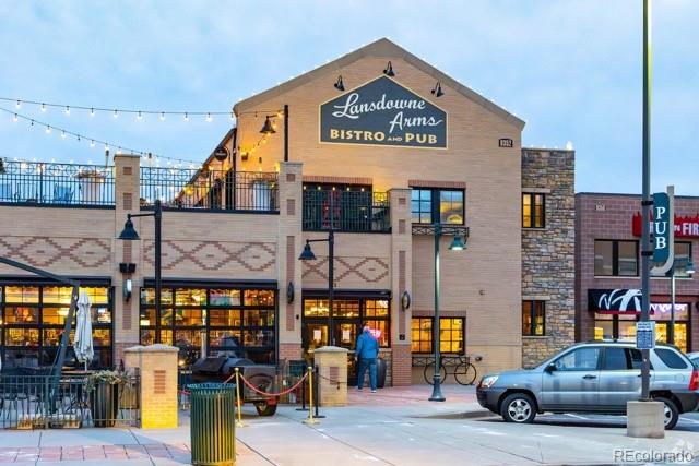10715 Riverbrook Circle Highlands Ranch, CO 80126 - Photo 28 of 30 a view of a car park in front of building