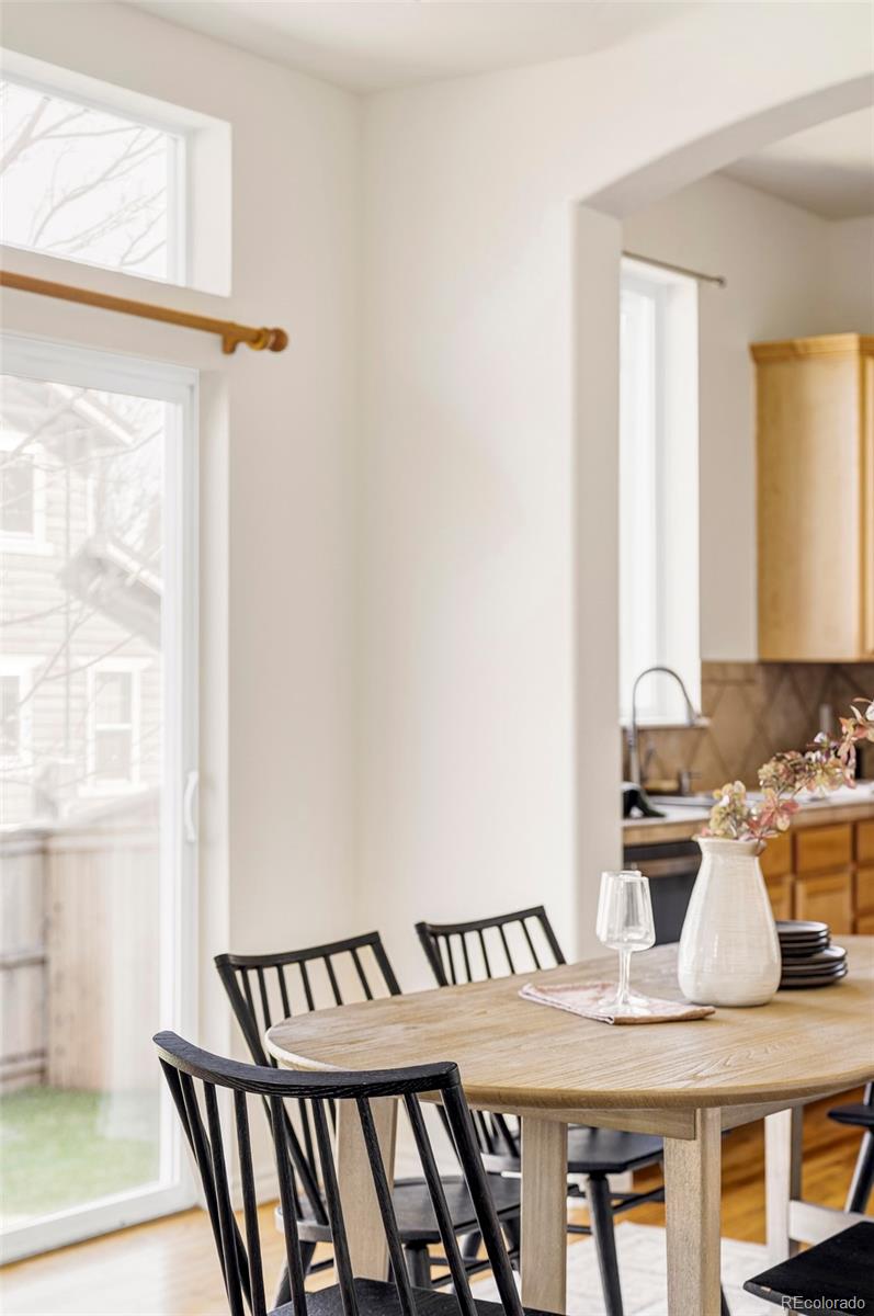 10715 Riverbrook Circle Highlands Ranch, CO 80126 - Photo 6 of 30 a view of a kitchen with granite countertop a sink and a window