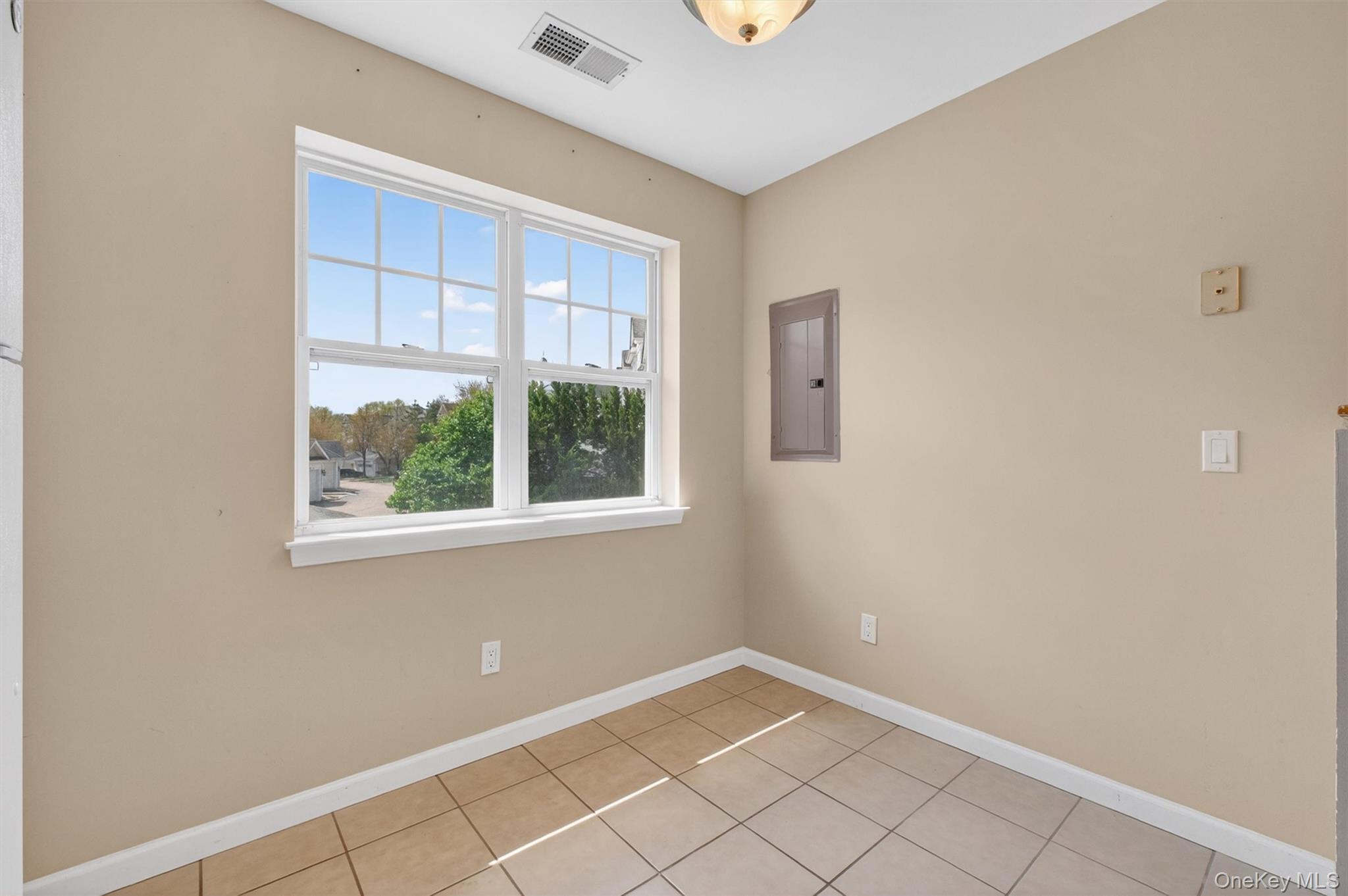 422 Highridge Court, Unit 422 Peekskill, NY 10566 - Photo 17 of 45 Filled with natural light and designed for comfort, the kitchen and dining area create a warm, welcoming setting for everything from casual meals to hosting guests.