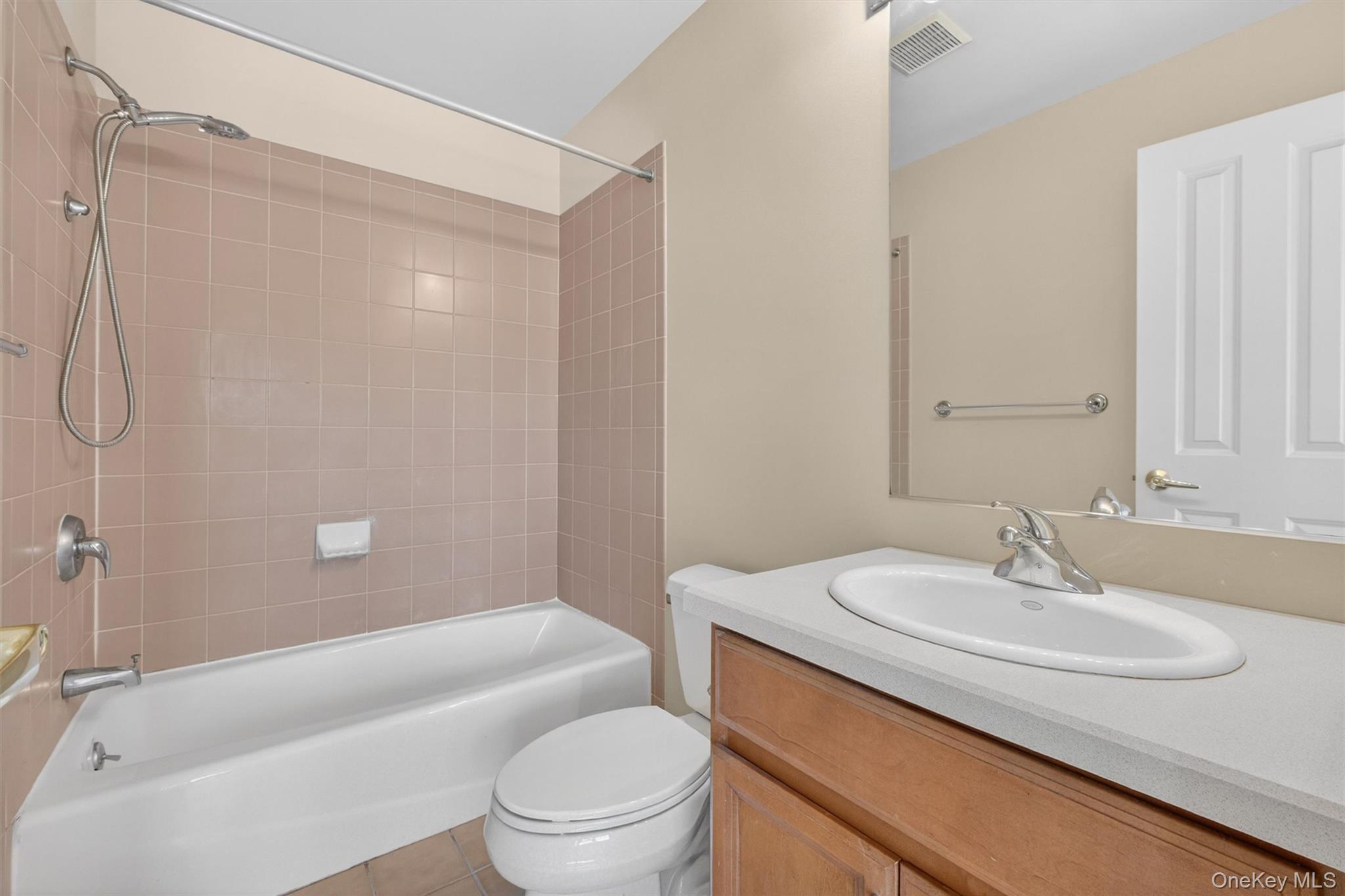 422 Highridge Court, Unit 422 Peekskill, NY 10566 - Photo 29 of 45 The second full bathroom is equally well-designed, offering a clean, bright space with quality finishes, a full tub and shower combination, and a functional layout that comfortably serves guests or the secondary bedroom with ease and convenience.