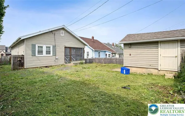 a house view with a garden space
