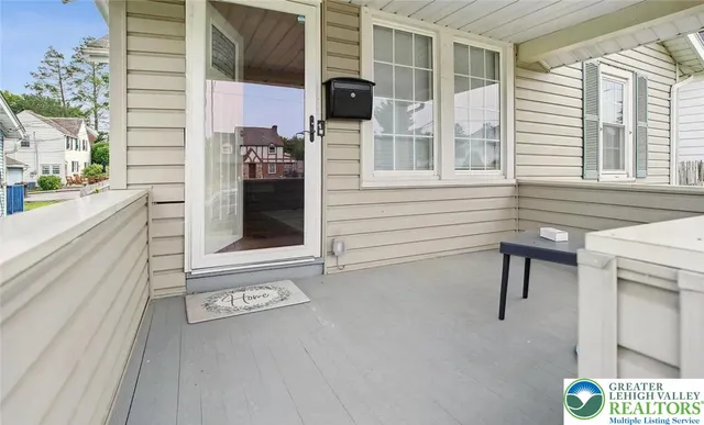 a view of a brick house with a windows