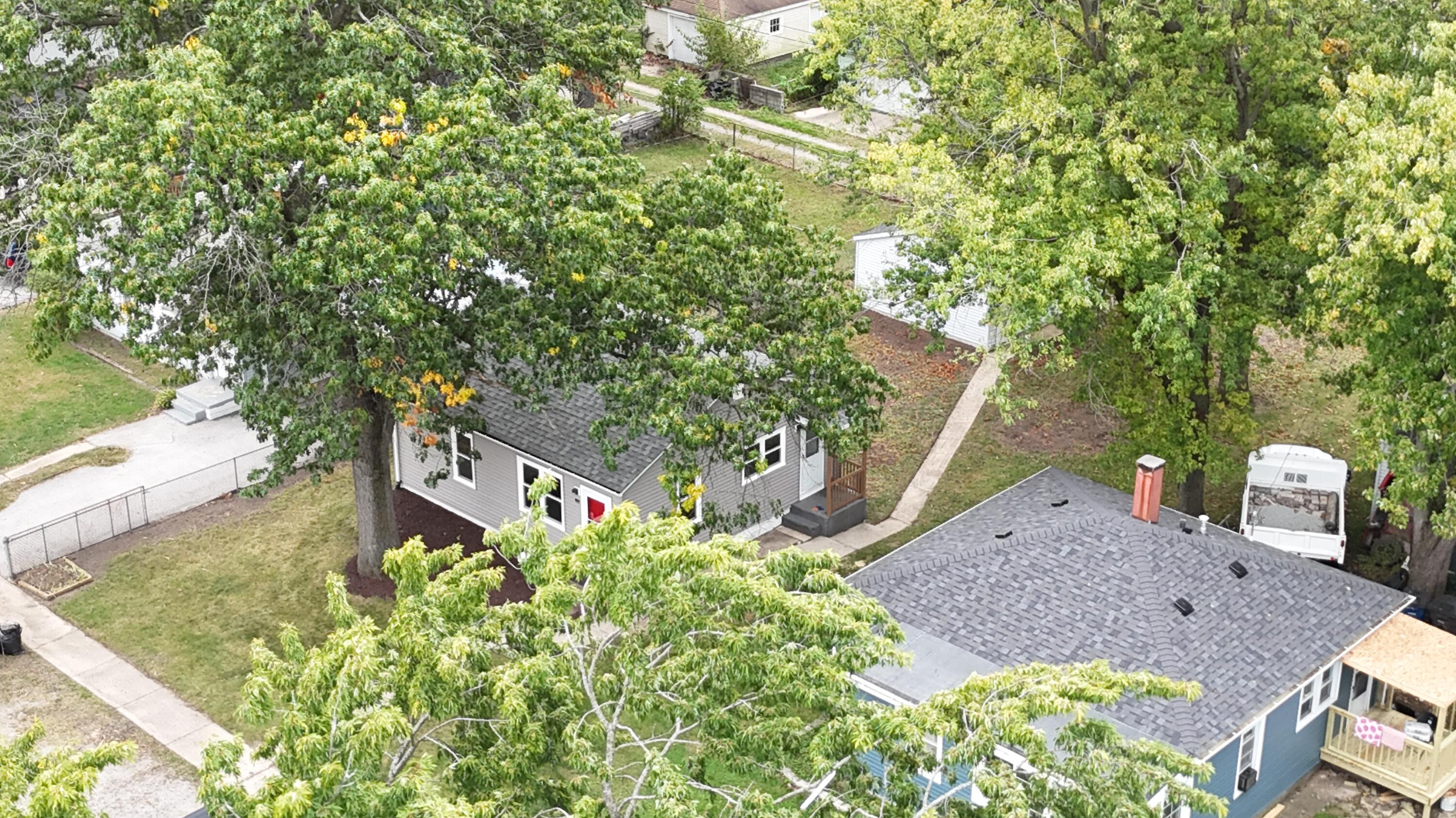 2854 Hancock Street Gary, IN 46405 - Photo 10 of 13 a sign that is sitting on a brick wall