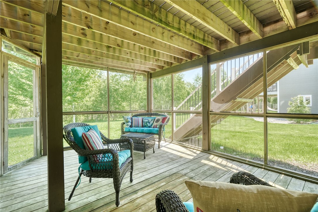 32 Ashlyn Rise Penfield, NY 14450 - Photo 46 of 50 Screened in patio with outlet for hottub.