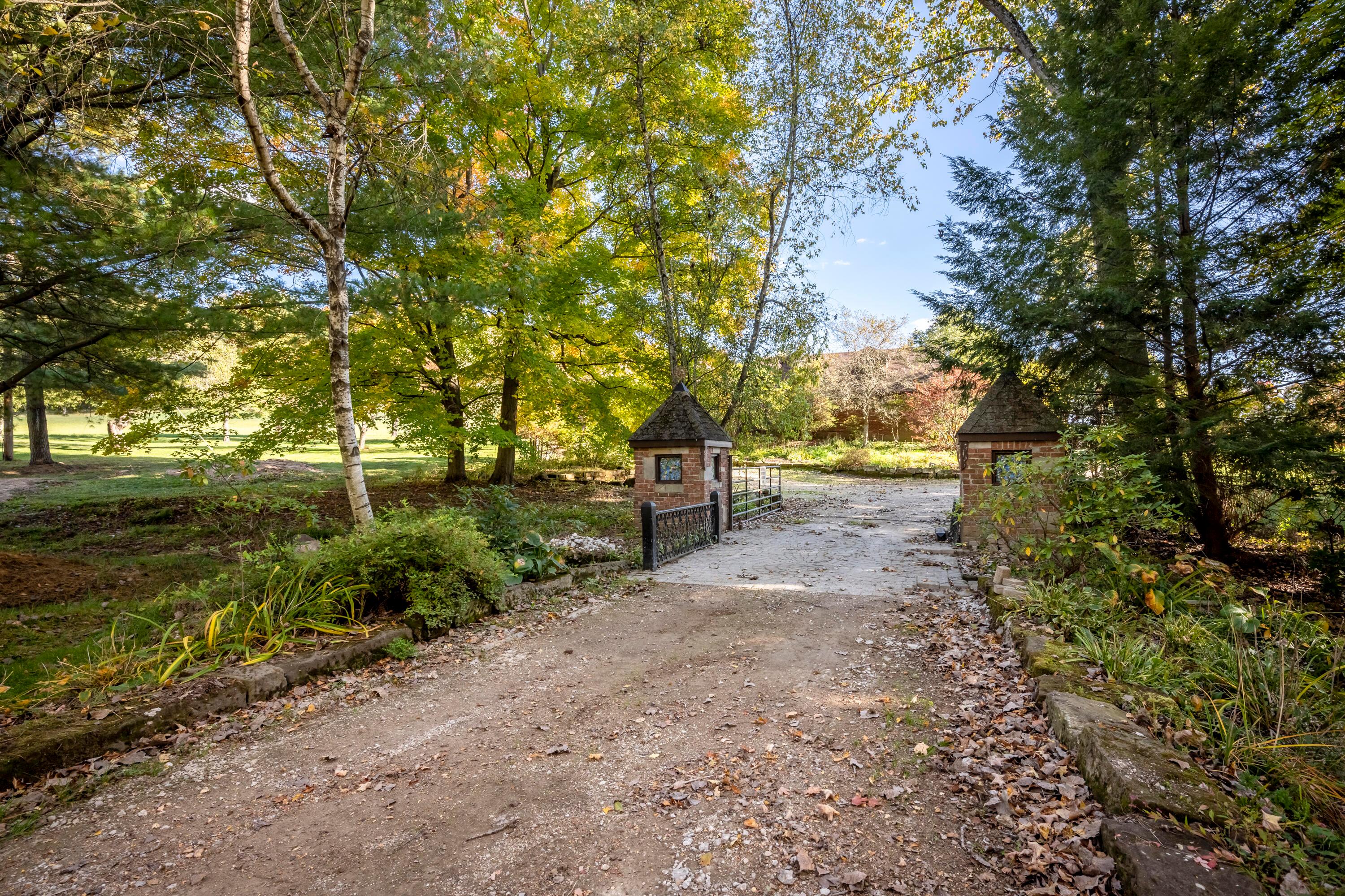1226 Hathaway Road Bellville, OH 44813 - Photo 5 of 55 Wrought-iron bridge over stream