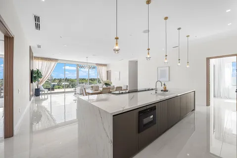 a kitchen with counter top space and sink