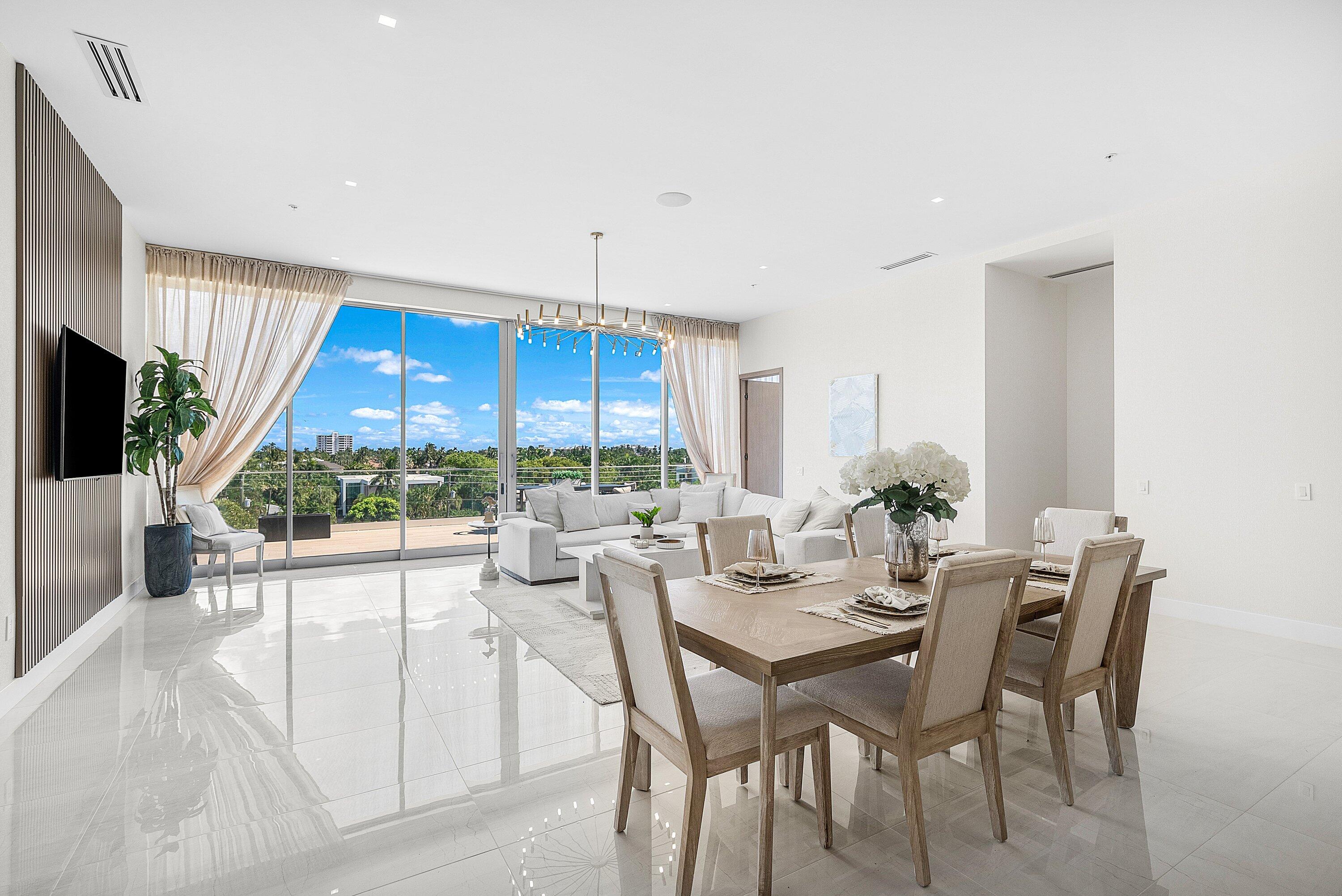 246 Northeast 6th Avenue, Unit PH Delray Beach, FL 33483 - Photo 9 of 36 a view of a dining room and livingroom view
