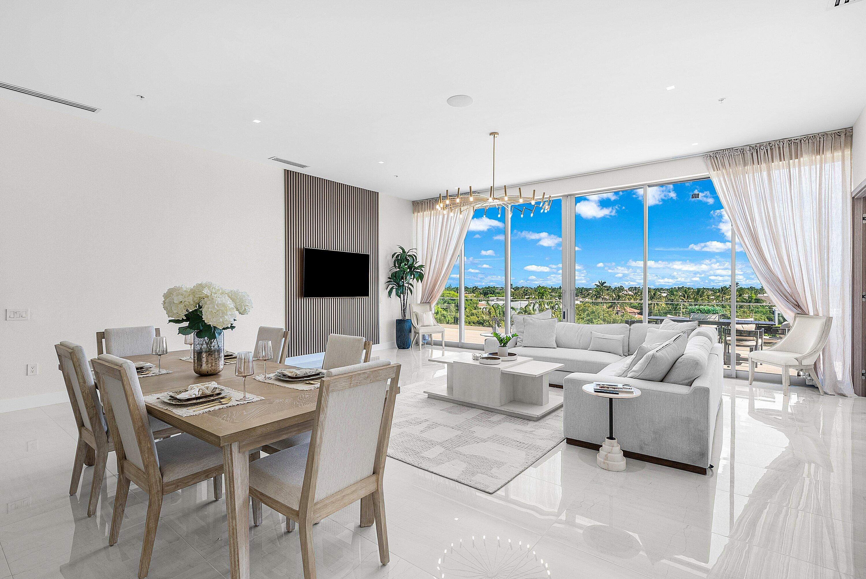 246 Northeast 6th Avenue, Unit PH Delray Beach, FL 33483 - Photo 10 of 36 a living room with furniture and a large window