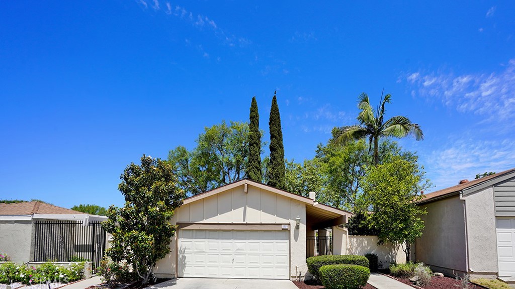 2909 Pinewood Court Fullerton, CA 92835 - Photo 2 of 33 a view of a house with a tree in the background