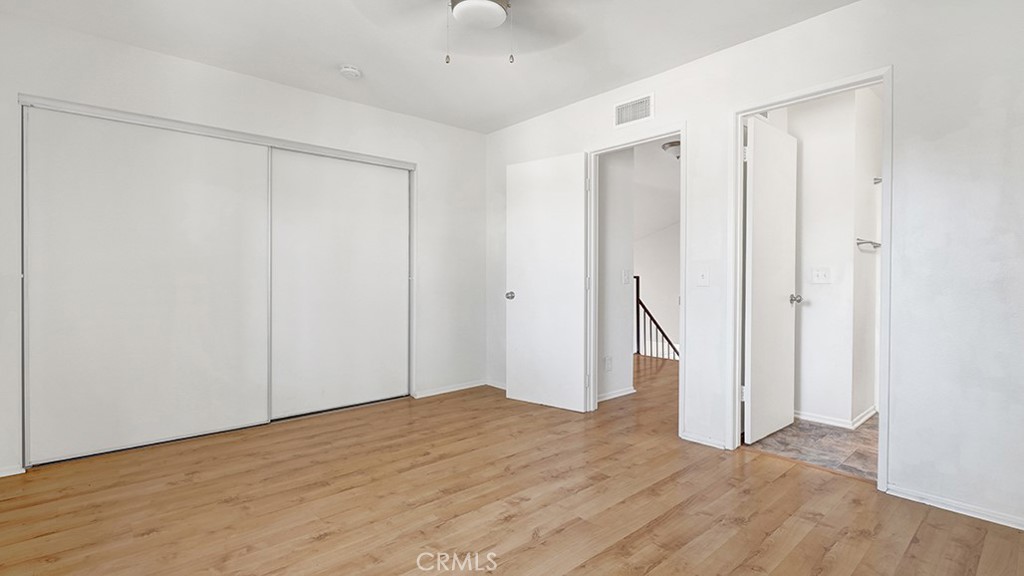 2909 Pinewood Court Fullerton, CA 92835 - Photo 24 of 33 a view of an empty room with wooden floor