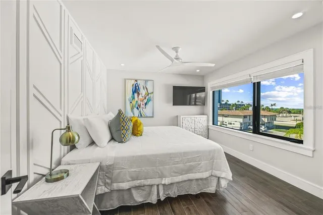 an aerial view of a house with a swimming pool yard and outdoor seating