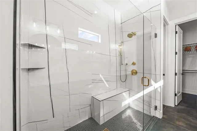 an aerial view of a city with ocean view