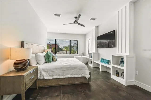 an outdoor space with pool and furniture