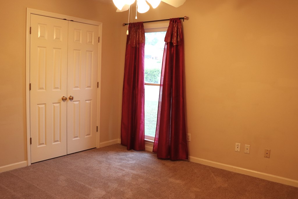 6008 Walters Loop Columbus, GA 31907 - Photo 15 of 33 an empty room with windows and closet