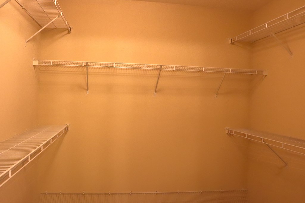6008 Walters Loop Columbus, GA 31907 - Photo 23 of 33 a view of a room with racks on the wall