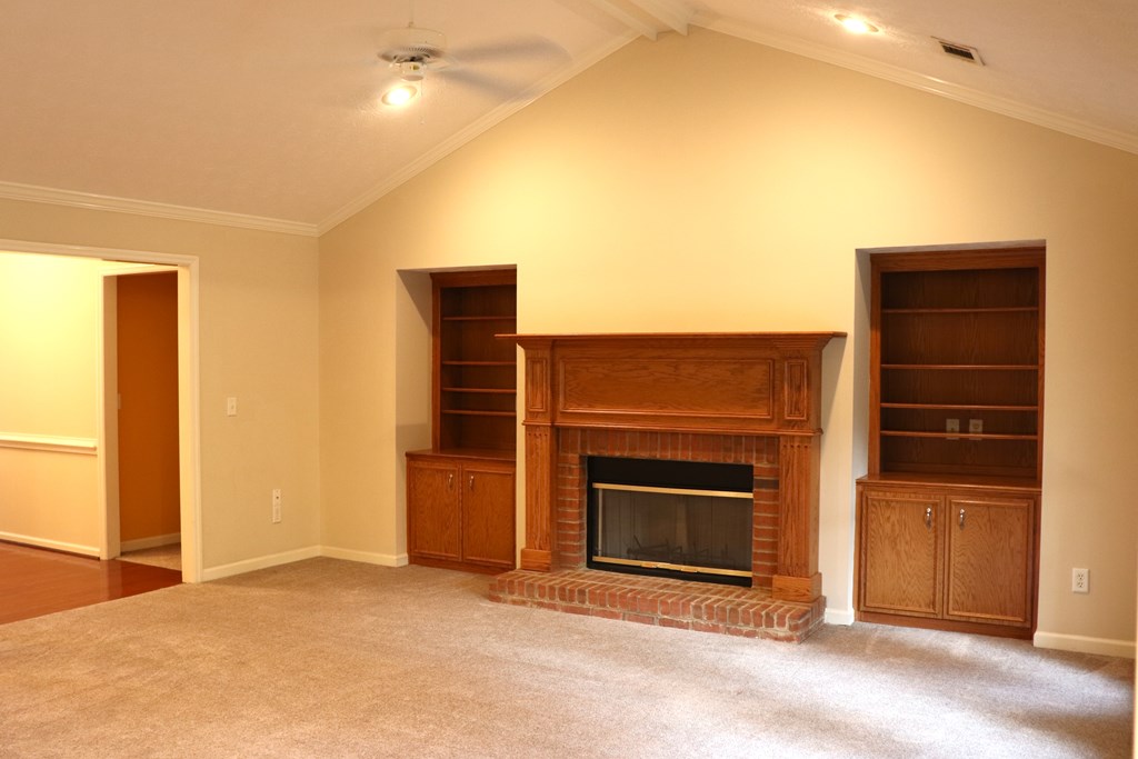 6008 Walters Loop Columbus, GA 31907 - Photo 5 of 33 a view of empty room with a fireplace and cabinet