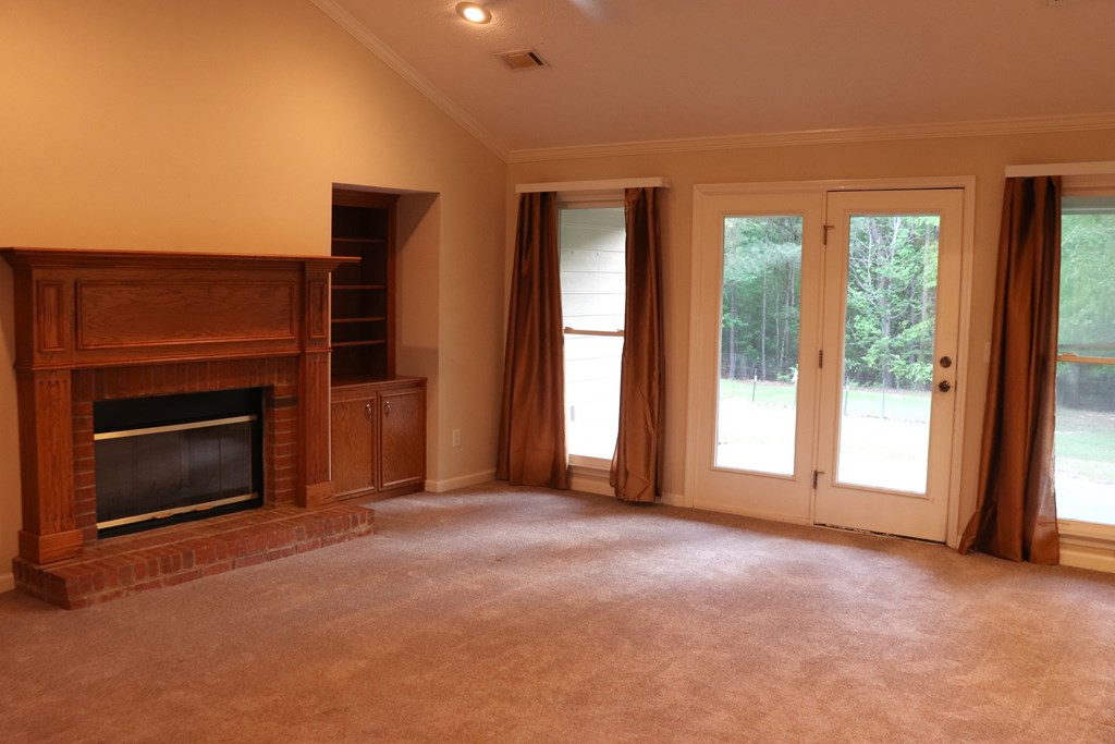 6008 Walters Loop Columbus, GA 31907 - Photo 6 of 33 a view of empty room with a fireplace