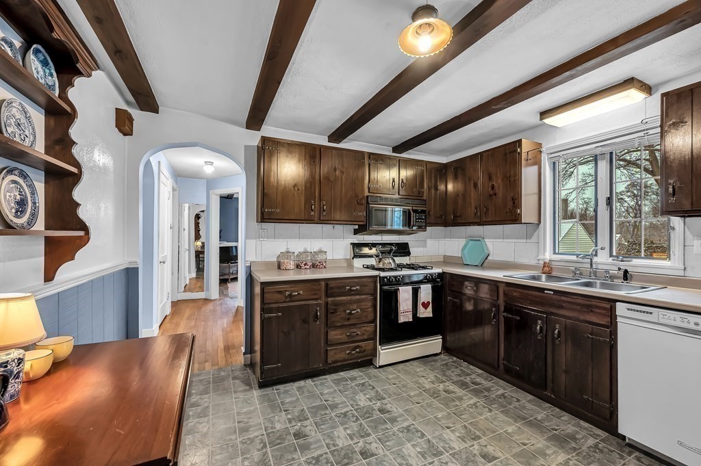20 Lenox Road Holyoke, MA 01040 - Photo 14 of 36 a large kitchen with stainless steel appliances granite countertop lots of counter top space and wooden floor