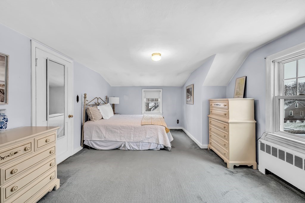 20 Lenox Road Holyoke, MA 01040 - Photo 21 of 36 a room with a bed and a dresser