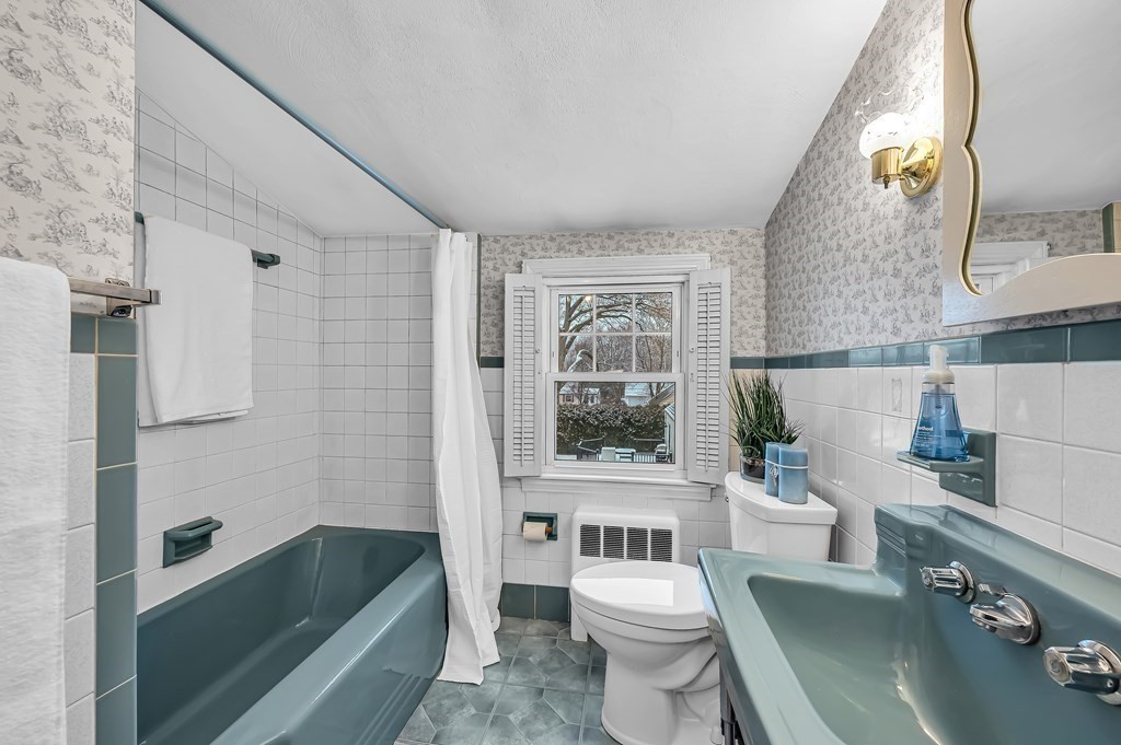 20 Lenox Road Holyoke, MA 01040 - Photo 23 of 36 a bathroom with a sink toilet and shower