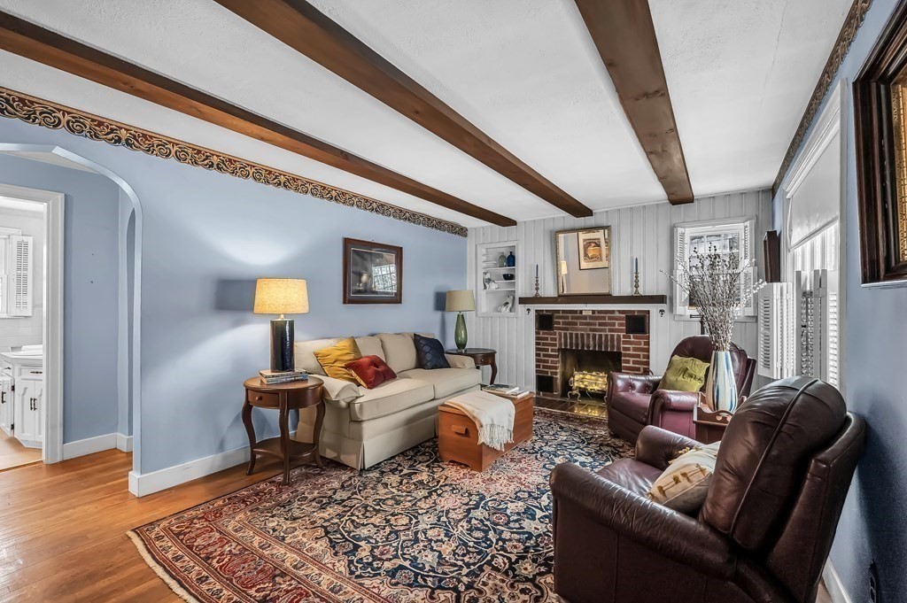 20 Lenox Road Holyoke, MA 01040 - Photo 9 of 36 a living room with furniture and a fireplace