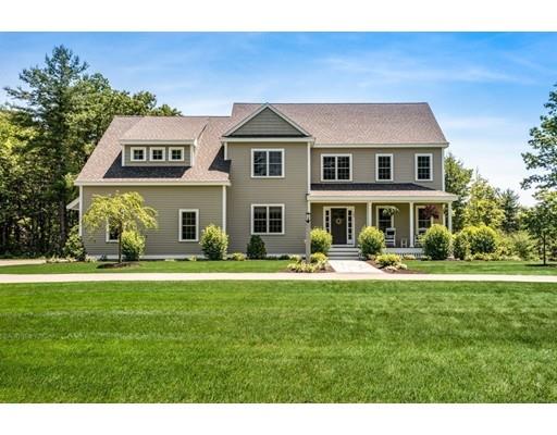 320 West Acton Road Stow, MA 01775 - Photo 1 of 39 a front view of a house with a garden and porch