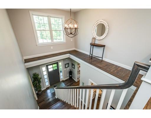 320 West Acton Road Stow, MA 01775 - Photo 17 of 39 a view of a hallway with wooden floor