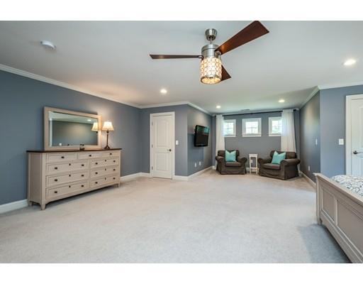 320 West Acton Road Stow, MA 01775 - Photo 20 of 39 a view of a livingroom with furniture and a flat screen tv