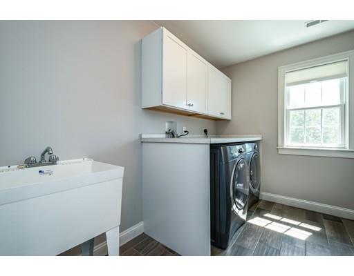 320 West Acton Road Stow, MA 01775 - Photo 24 of 39 a kitchen with a refrigerator and a sink