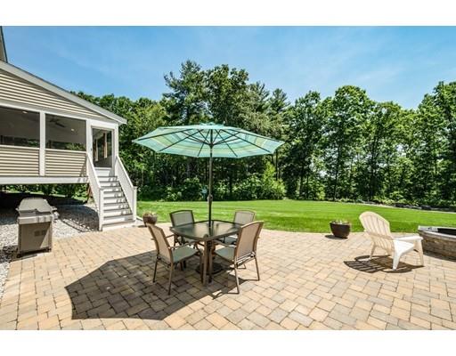 320 West Acton Road Stow, MA 01775 - Photo 31 of 39 a view of a house with backyard sitting area and garden