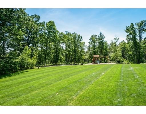 320 West Acton Road Stow, MA 01775 - Photo 33 of 39 a view of a field of grass and trees