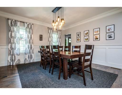 320 West Acton Road Stow, MA 01775 - Photo 7 of 39 a view of a dining room with furniture and chandelier