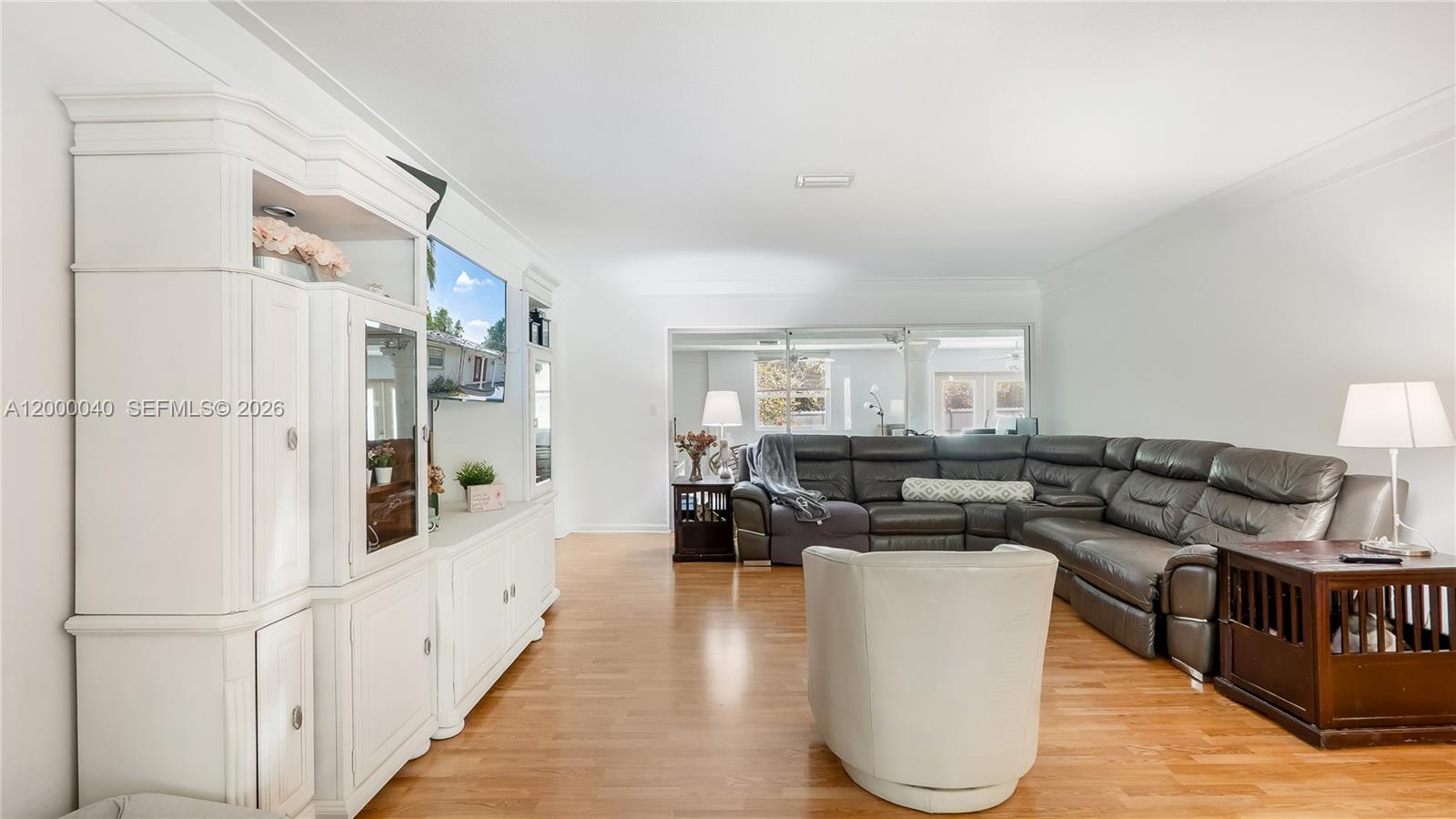 4020 Southwest 2nd Street Plantation, FL 33317 - Photo 11 of 43 a living room with furniture and a large window